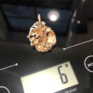 14k gold nugget pendant.